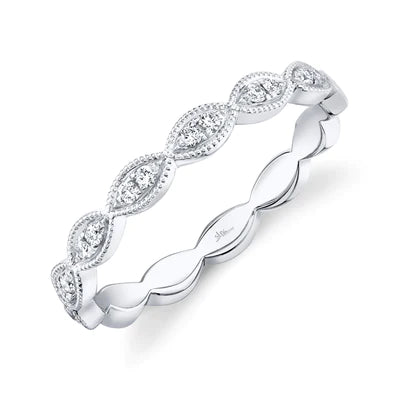 Delicate white-gold diamond band with alternating marquise-shaped milgrain diamond motifs and twisted polished links