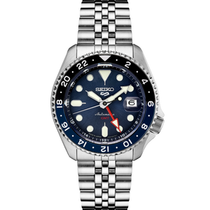 Front view of Seiko SSK003 watch with blue sunburst dial, red GMT hand, black-blue 24-hour bezel, and jubilee bracelet