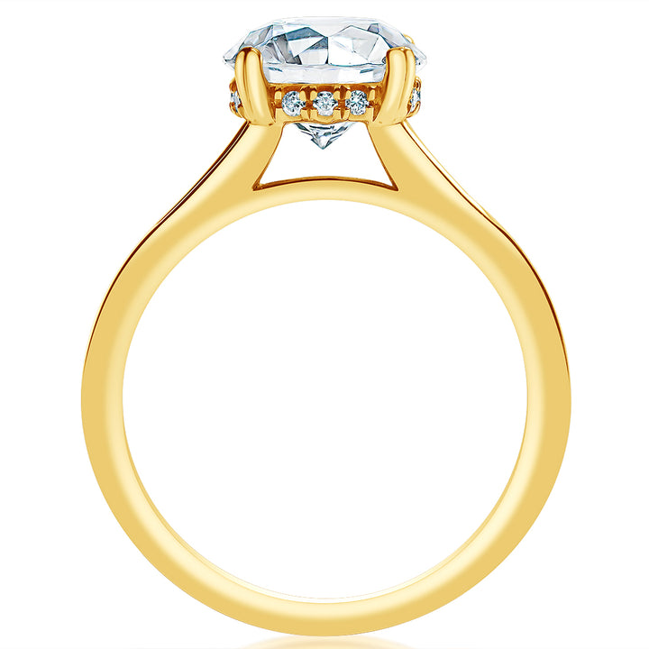Classique Creations 14K yellow gold diamond engagement ring with hidden diamonds