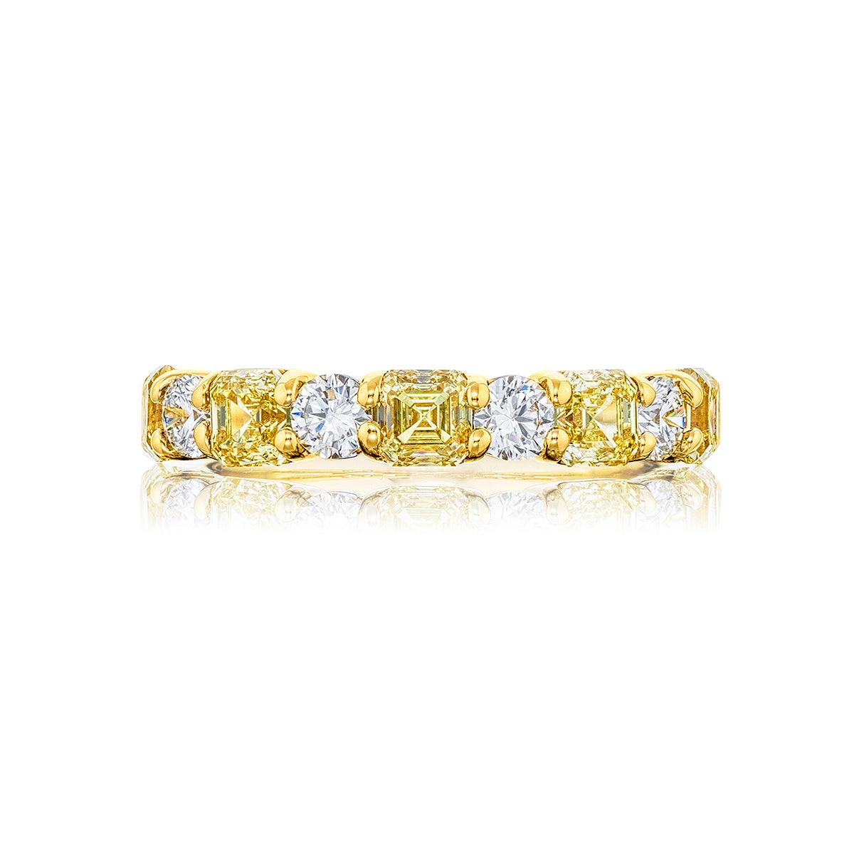 Front view of 18K yellow-gold diamond band with fancy yellow emerald-cut and alternating round white diamonds