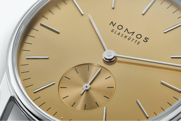 NOMOS Orion 33 Gold - Gunderson's Jewelers