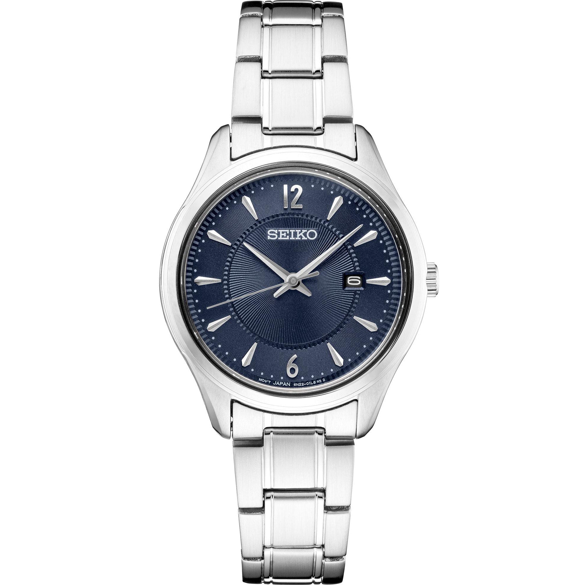Front view of Seiko SUR425 watch showcasing blue sunburst dial, date window, and stainless steel bracelet on white background