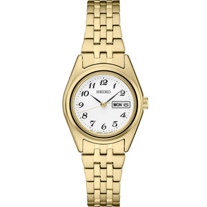 Front view of Seiko SUR440 gold-tone watch showcasing white dial with Arabic numerals and day-date window on white background